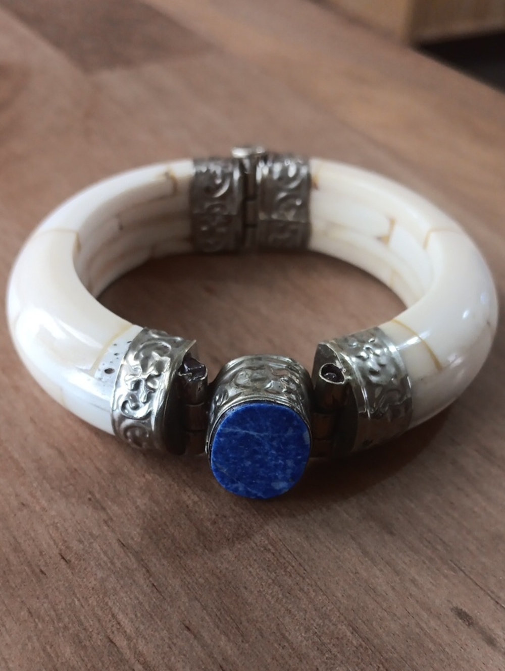 Ivory Bracelet with Blue Lapis Accent and Embossed Metal Detailing